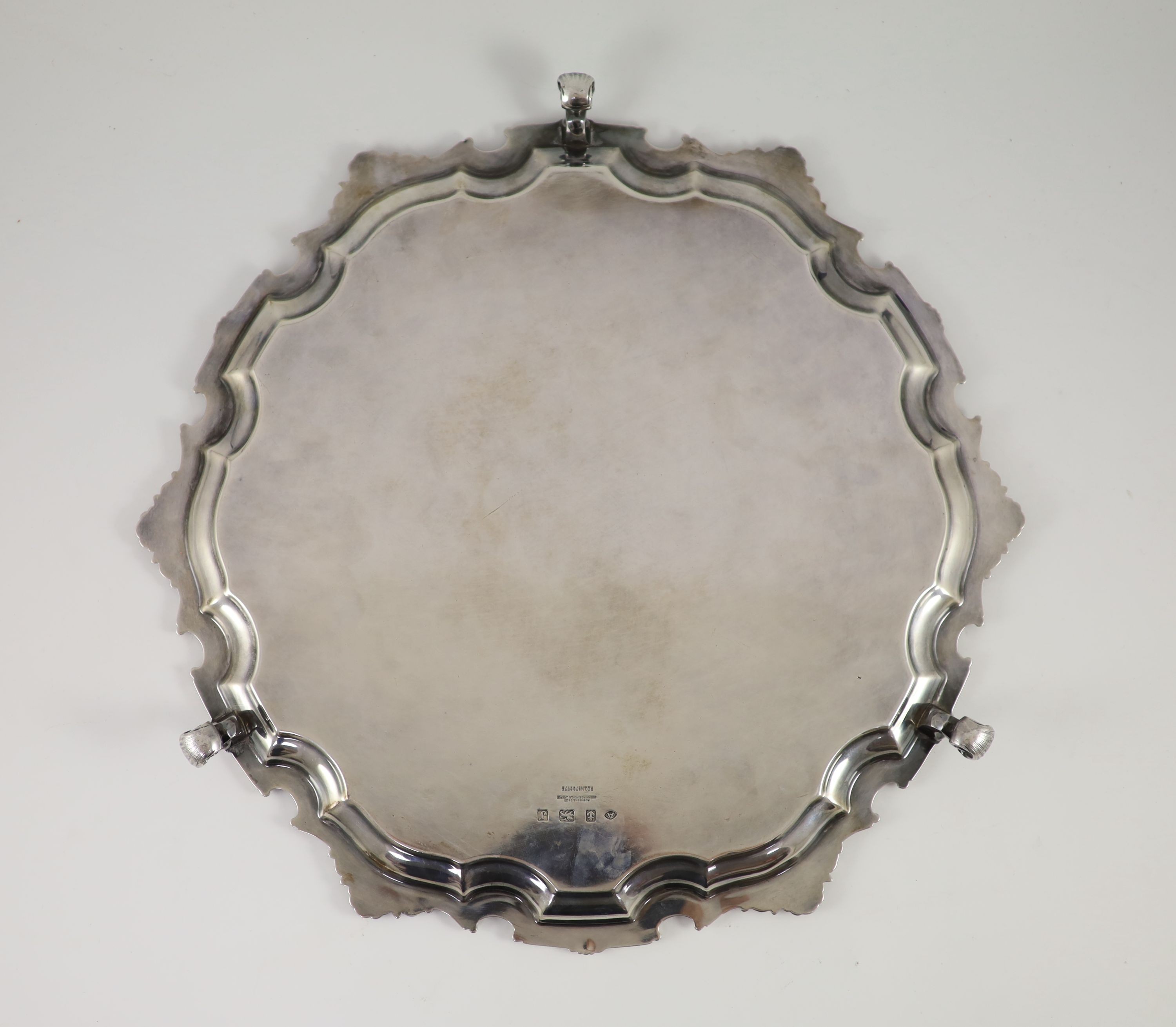 A George V shaped circular salver with '1935 Singapore Turf Club' engraved inscription